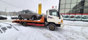 Эвакуация легкового автомобиля зимой в Санкт-Петербурге после неисправности катушек зажигания